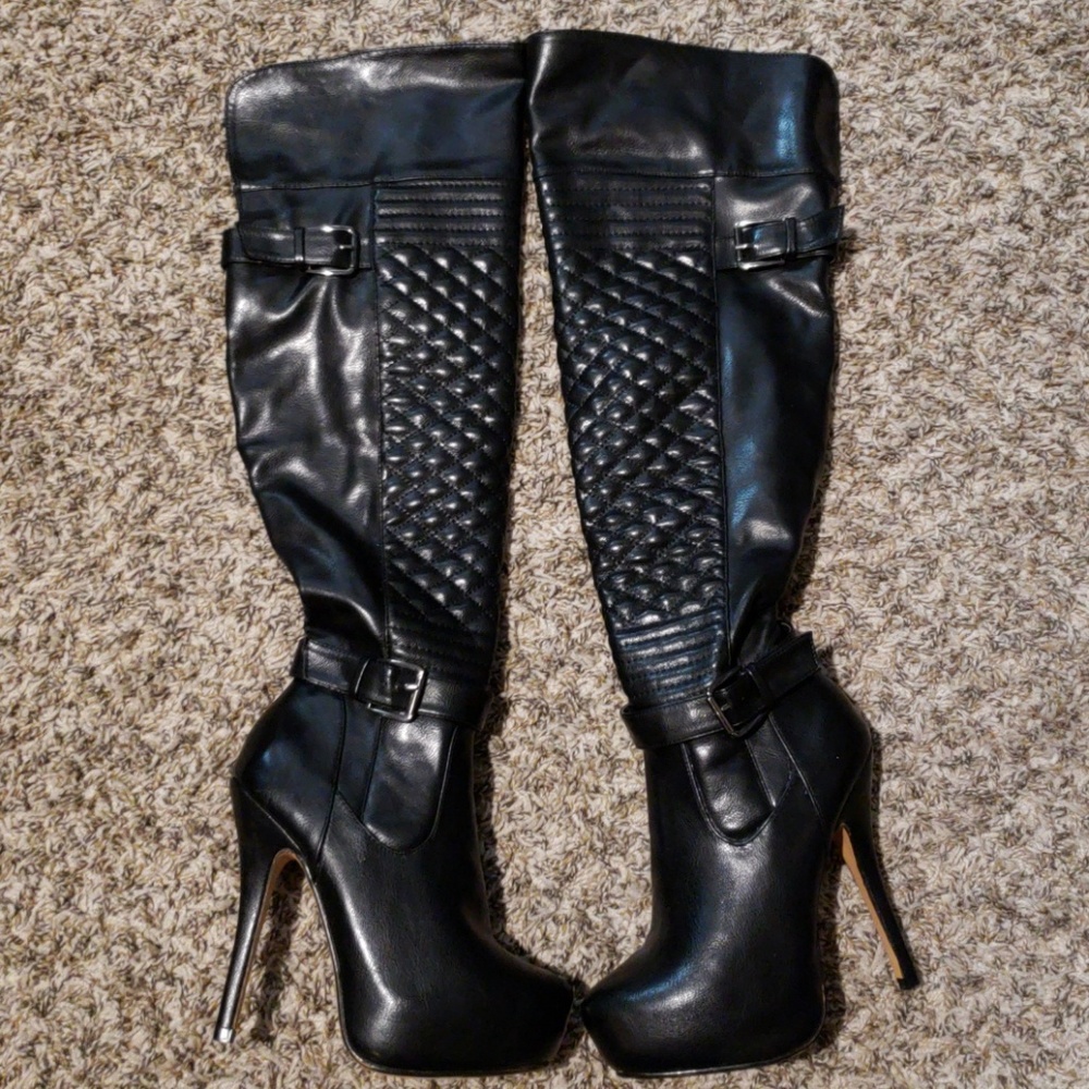Over the knee black boots